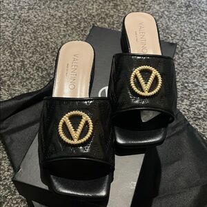 Valentino Black Mules with Gold Detailing